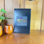 The Finishers Choice Tookbox sitting on counter with wooden tumblers