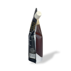 Sinners Select honey pouch on a white background - Side view with spout